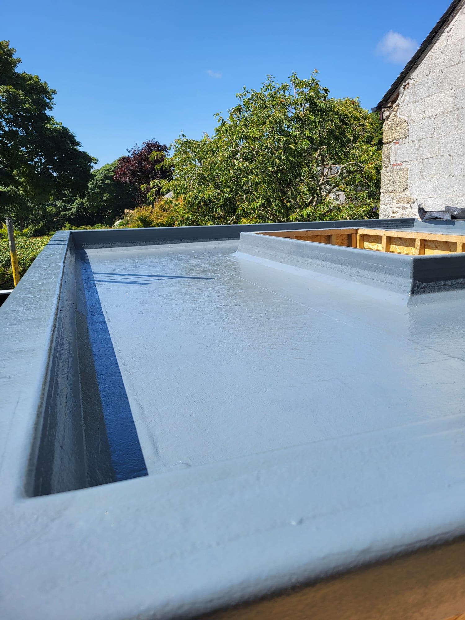 Completed GRP flat roof with skylight surround